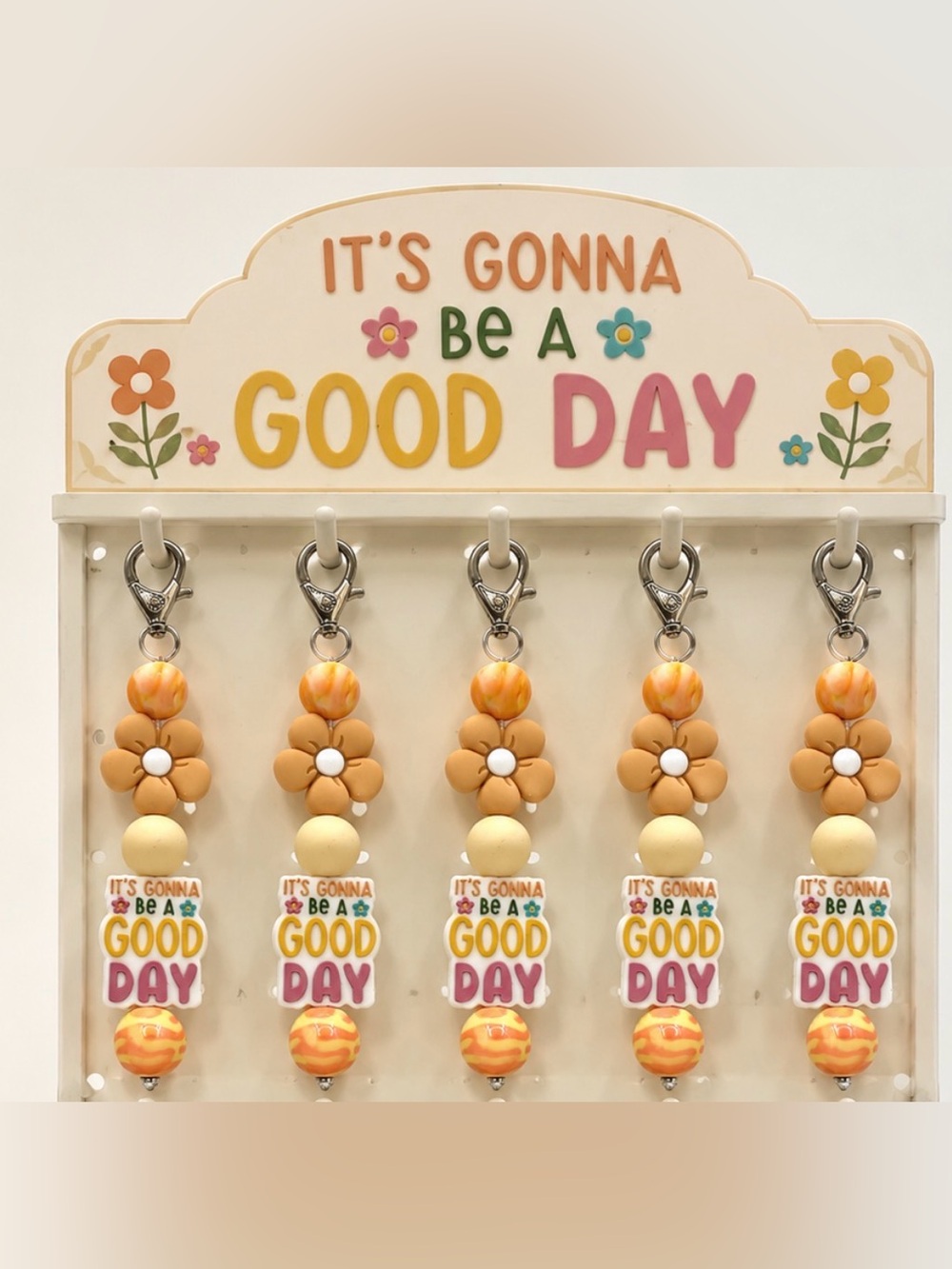 Handcrafted Coral and Cream Keychain with Daisy and Charm